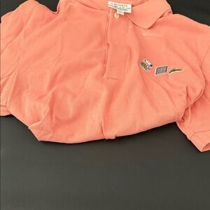 Lacoste Men Coral Pink Polo with Playful Embroidered Motifs
